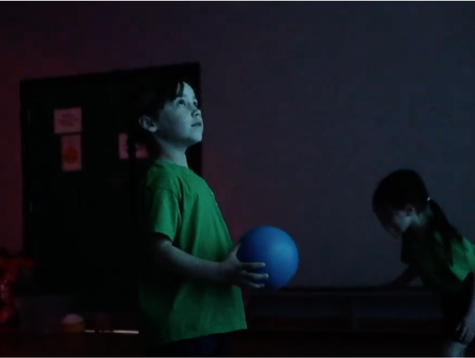 Children interacting with iSports wall