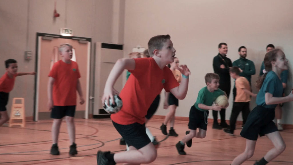 Children interacting with iSports Wall